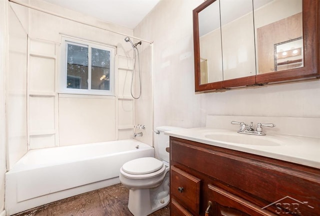 full bathroom featuring toilet,  shower combination, wood finished floors, and vanity