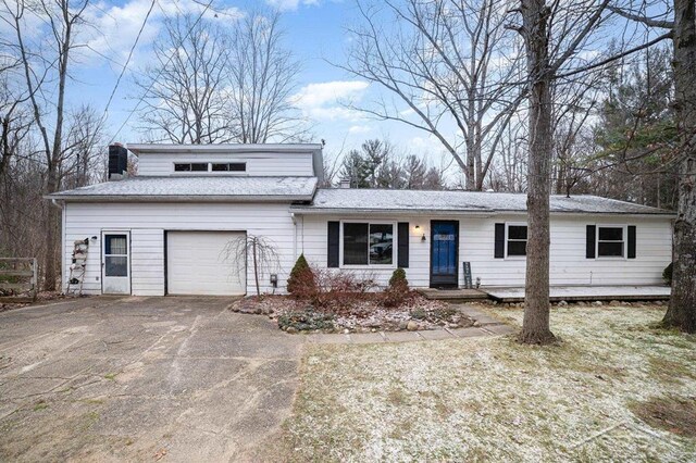 front facade with a garage