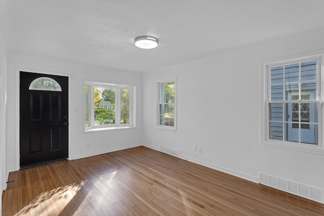 foyer featuring hardwood / wood-style flooring