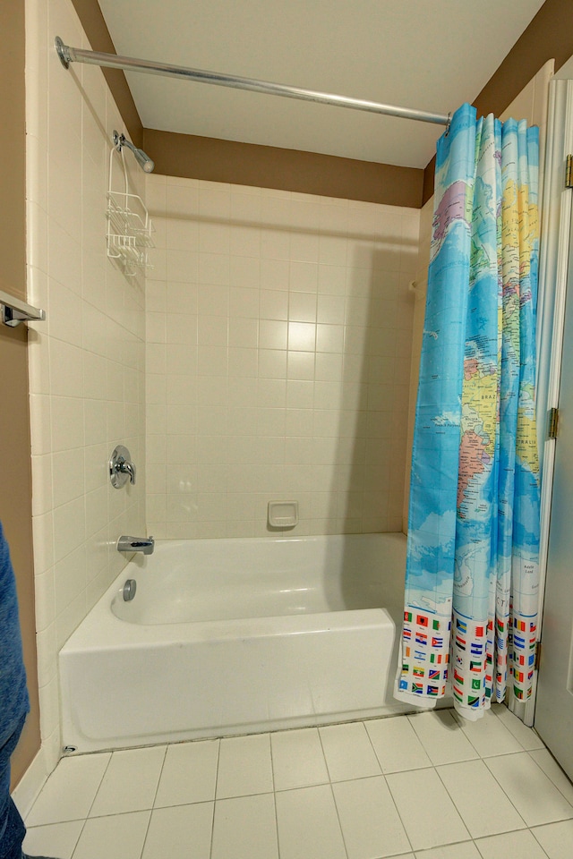 bathroom featuring tile patterned floors and shower / tub combo