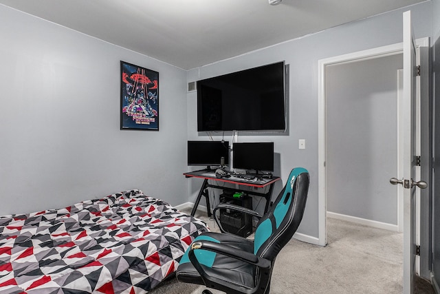 bedroom with light carpet