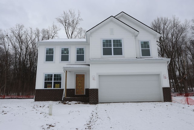 view of front of property with a garage