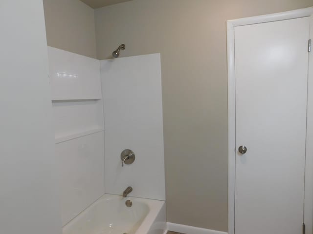 bathroom with shower / bathtub combination