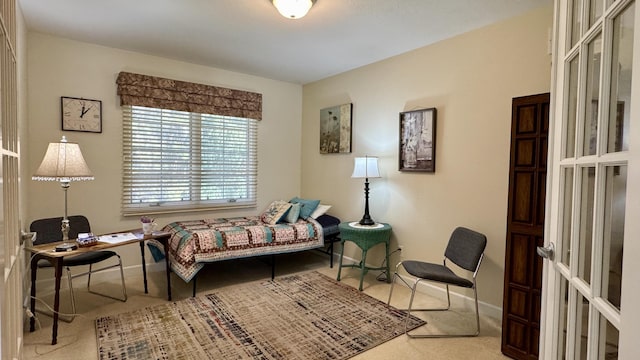 interior space featuring baseboards