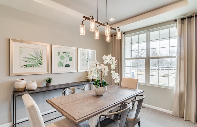 view of carpeted dining space