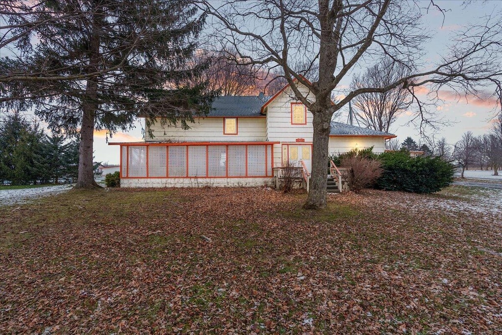 view of property exterior at dusk