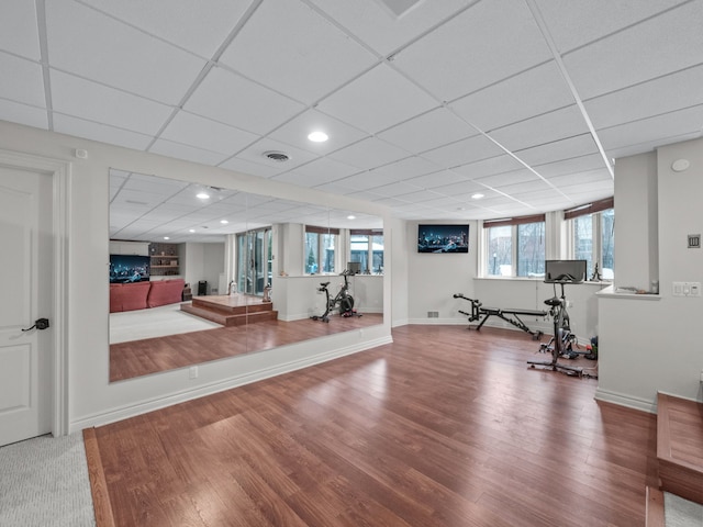 exercise area featuring hardwood / wood-style floors