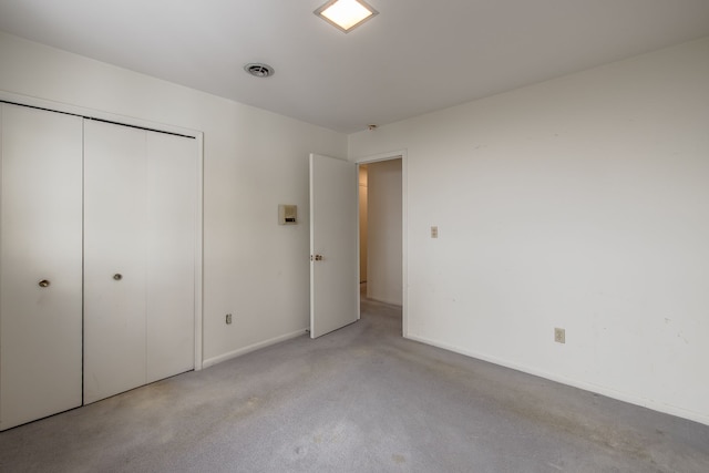 unfurnished bedroom featuring a closet