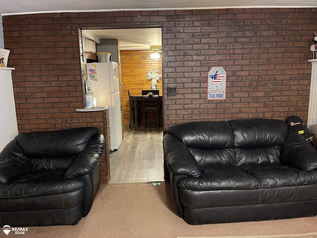 living room with brick wall