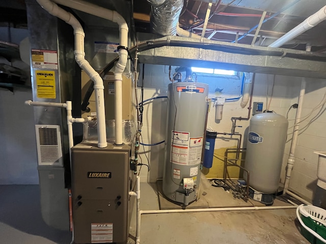 utility room with gas water heater