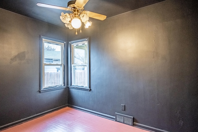 unfurnished room featuring ceiling fan