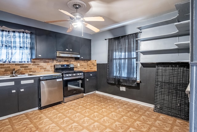 kitchen featuring backsplash, ceiling fan, sink, and appliances with stainless steel finishes