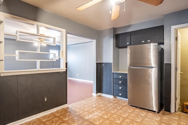 kitchen featuring stainless steel refrigerator