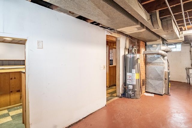 basement with heating unit and water heater