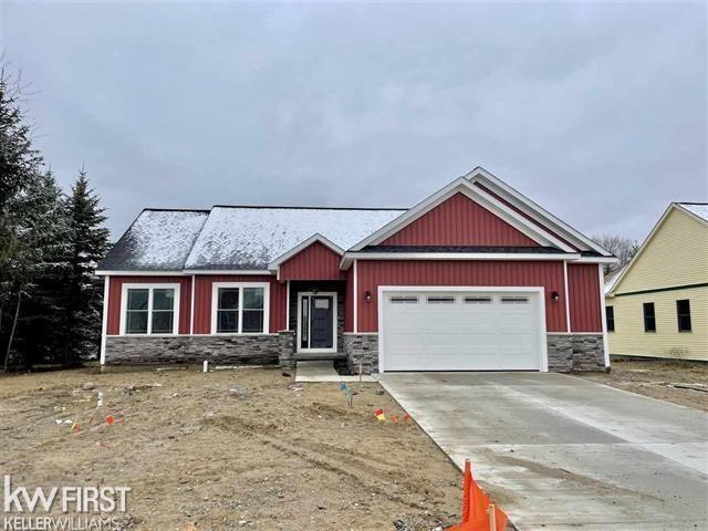 craftsman-style house featuring a garage