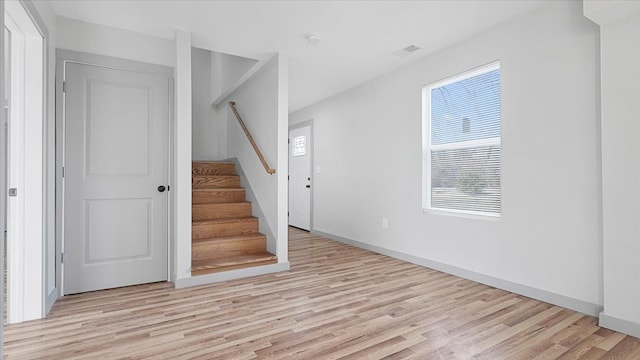 foyer with light hardwood / wood-style flooring