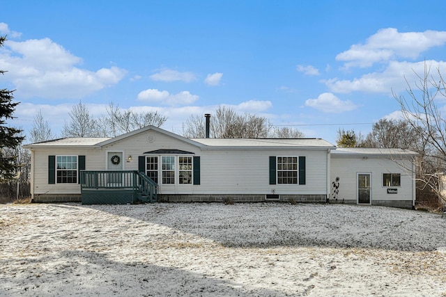 manufactured / mobile home featuring a deck