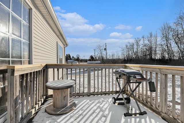 view of snow covered deck