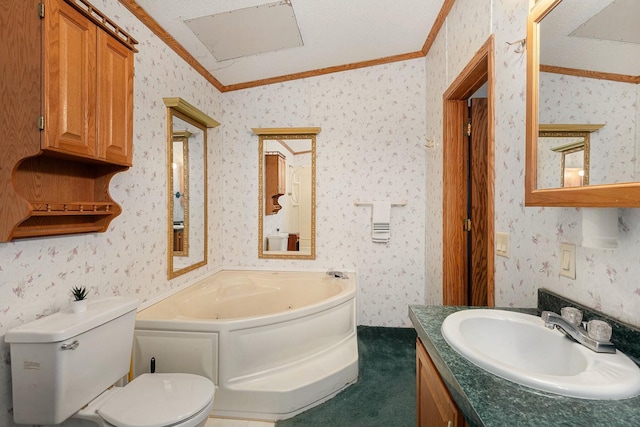 bathroom featuring ornamental molding, a washtub, vanity, toilet, and lofted ceiling