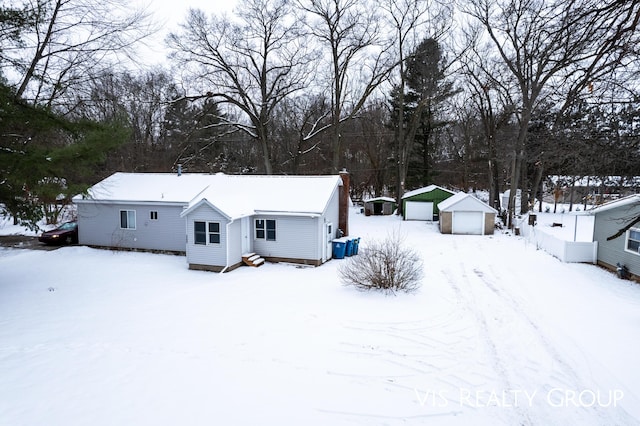 exterior space featuring an outdoor structure and a garage