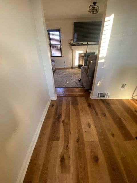 hall featuring hardwood / wood-style flooring