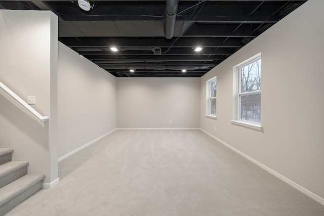 basement with light carpet