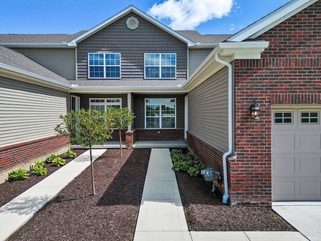 property entrance featuring a garage