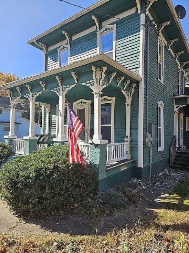 italianate home with covered porch