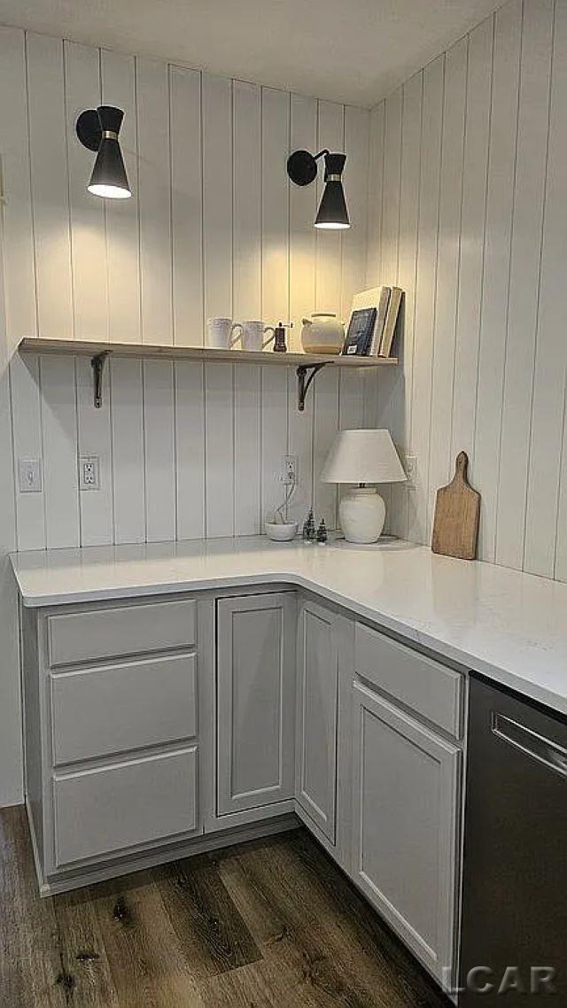 kitchen with dark wood-type flooring