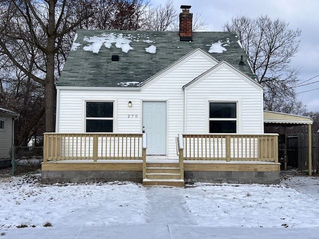 view of snow covered house