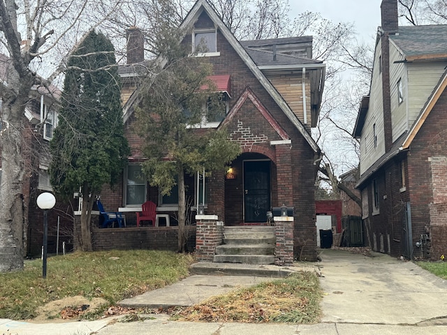 tudor home with a porch