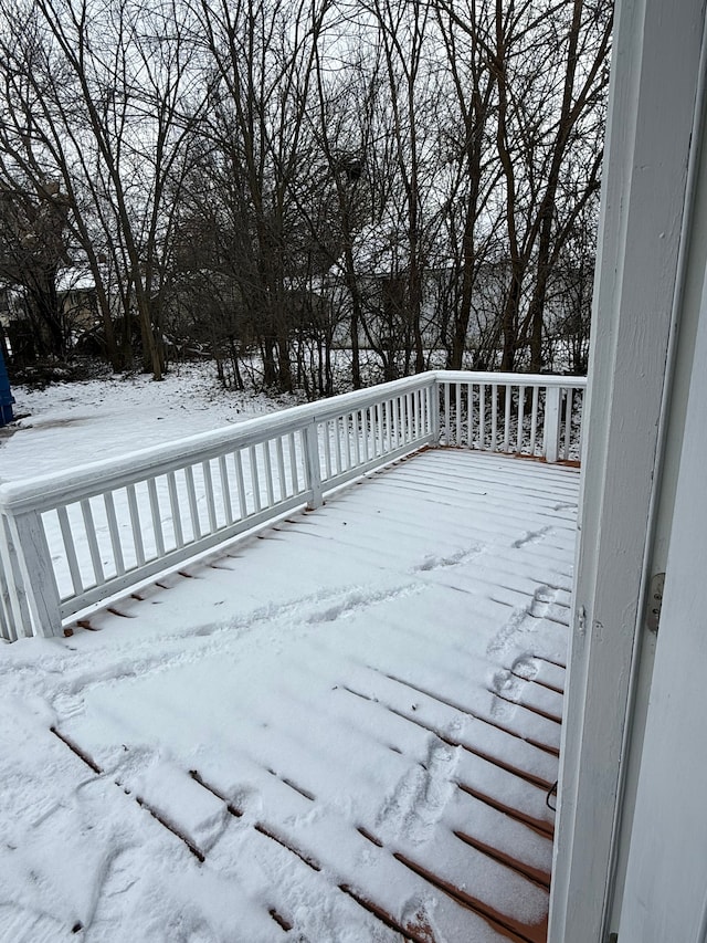 view of snow covered deck