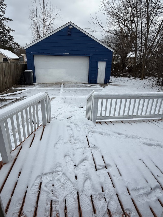 view of snow covered garage