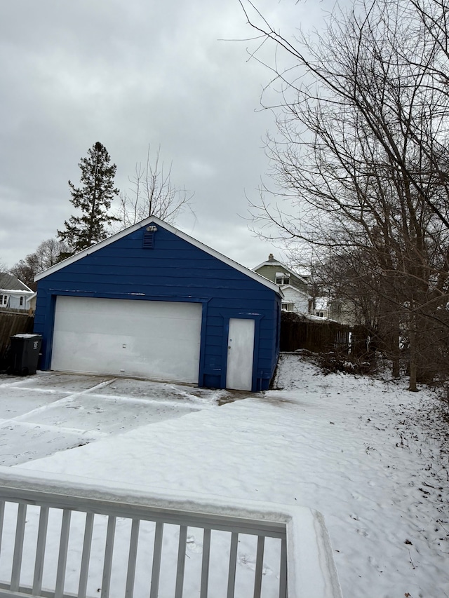 view of snow covered garage