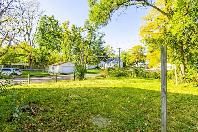 view of yard with a garage