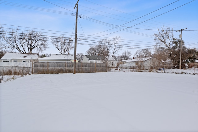 view of yard covered in snow