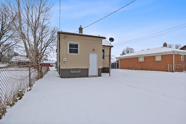 view of snow covered property