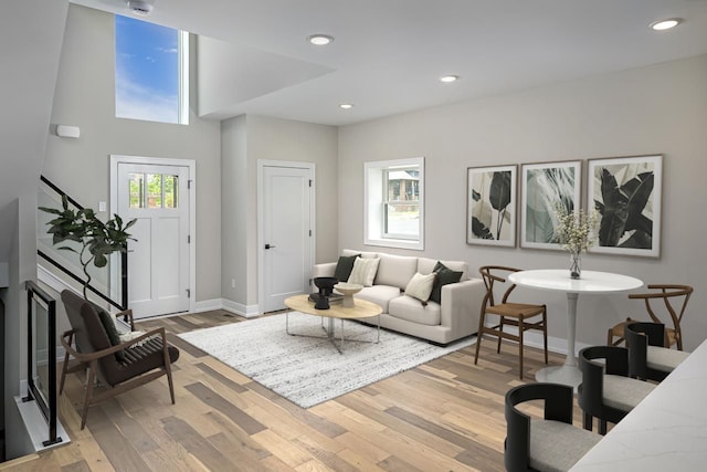 3634 Trumbull St Unit 65, Detroit, MI 48208 - living room featuring light hardwood / wood-style floors