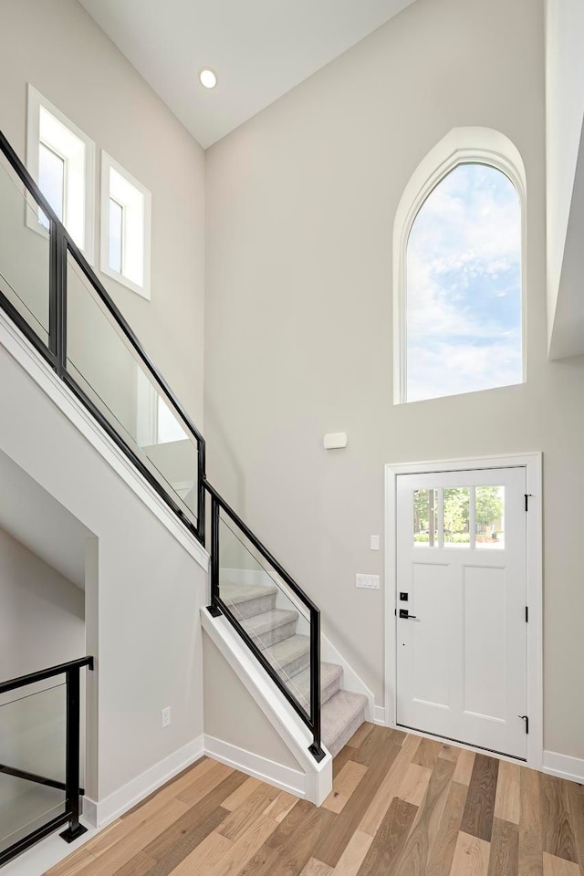 3634 Trumbull St Unit 65, Detroit, MI 48208 - foyer featuring a towering ceiling and light wood-type flooring
