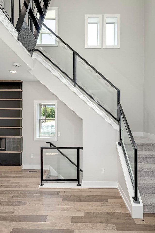 3634 Trumbull St Unit 65, Detroit, MI 48208 - stairs featuring wood-type flooring