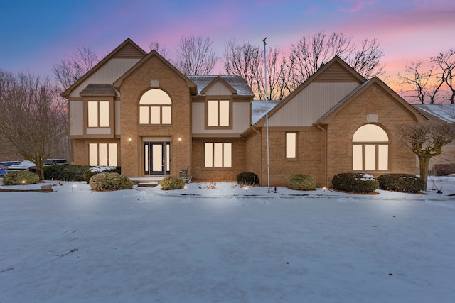 view of front of home featuring brick siding