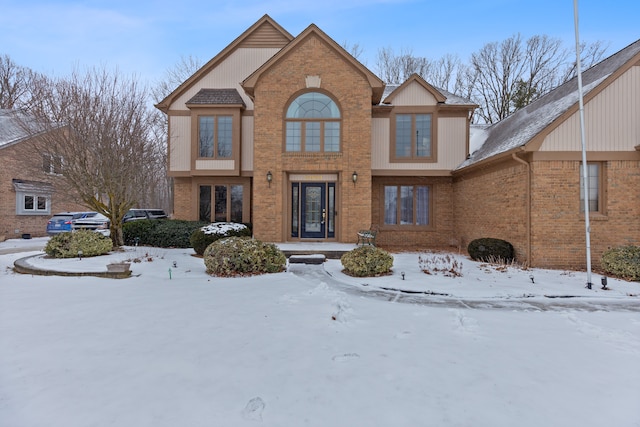 view of front of house with brick siding