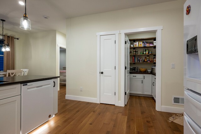 pantry featuring radiator heating unit