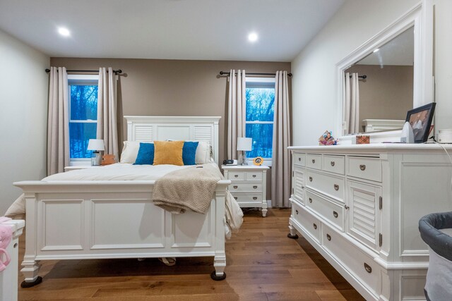 bedroom featuring dark hardwood / wood-style flooring