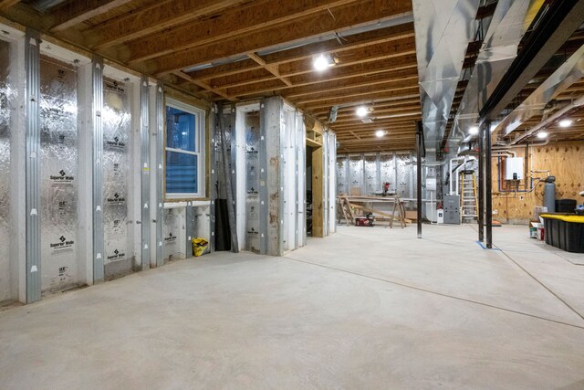 basement featuring heating unit