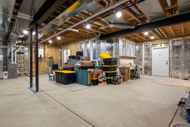 basement featuring heating unit