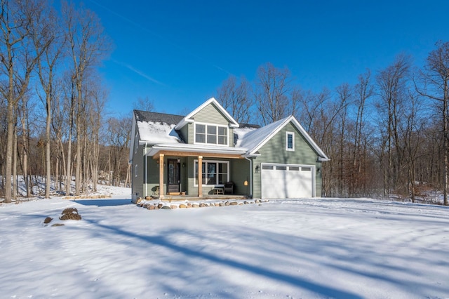 view of front of property featuring a garage and a porch