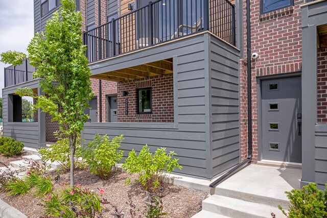 view of property exterior with a balcony