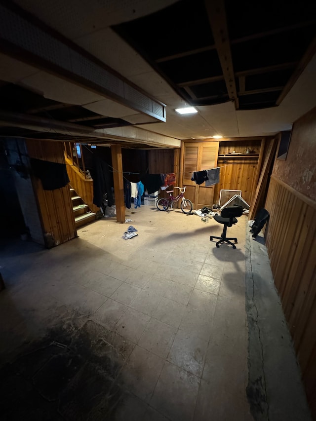 basement with wood walls