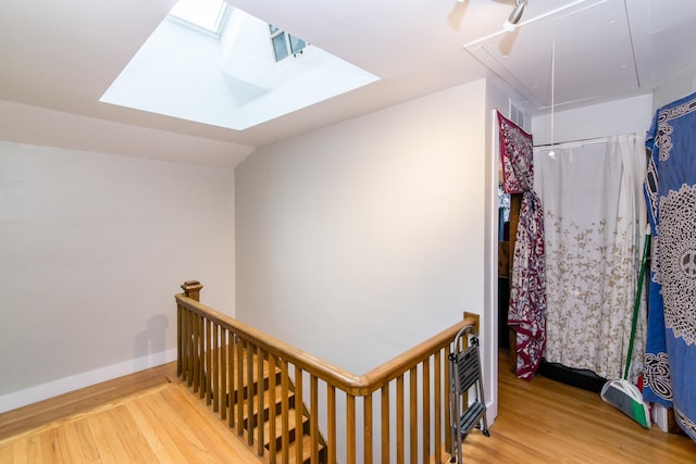 stairway with wood-type flooring